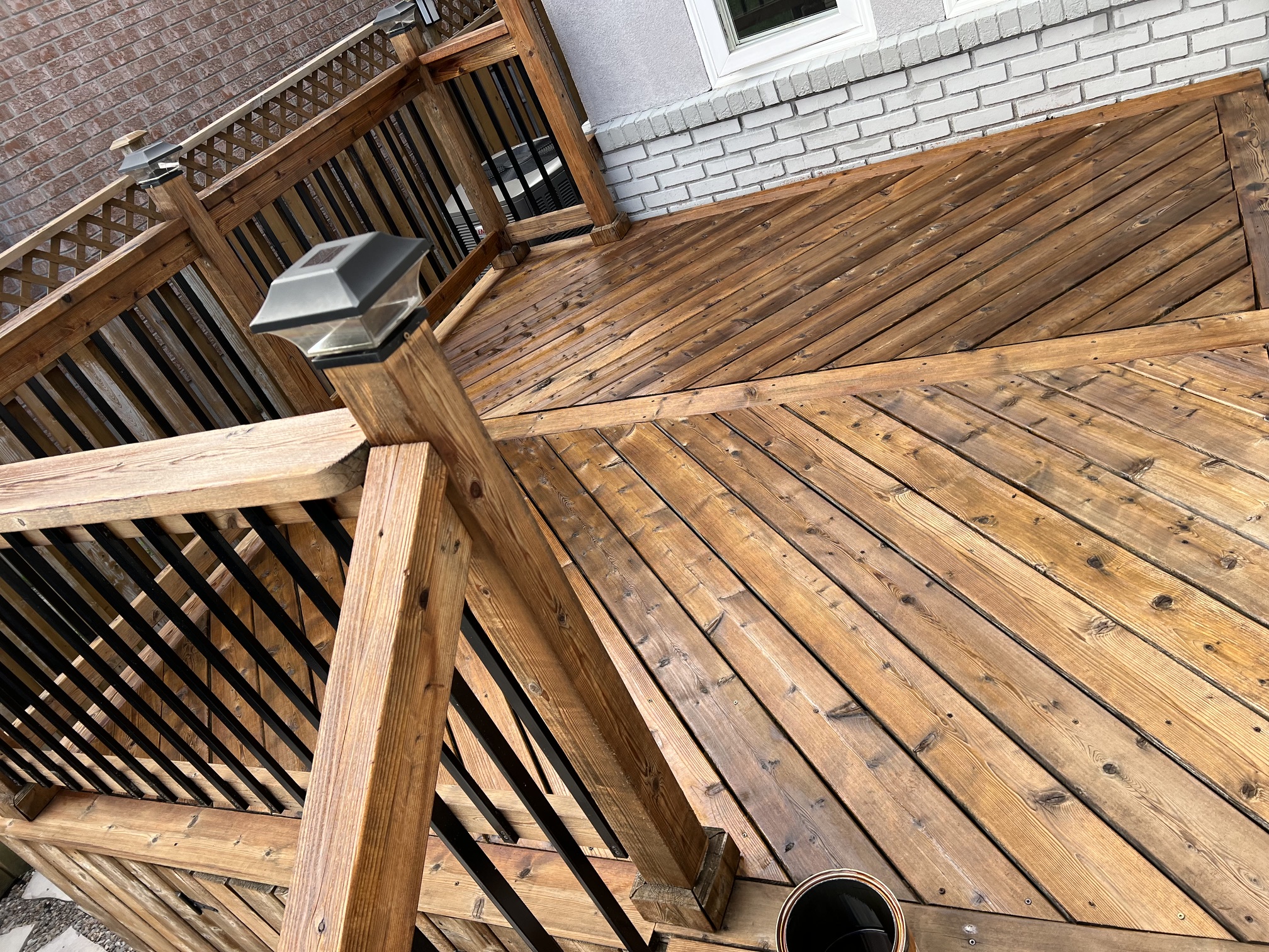 Professional deck staining and sealing by C&N Window Cleaning in Durham Region